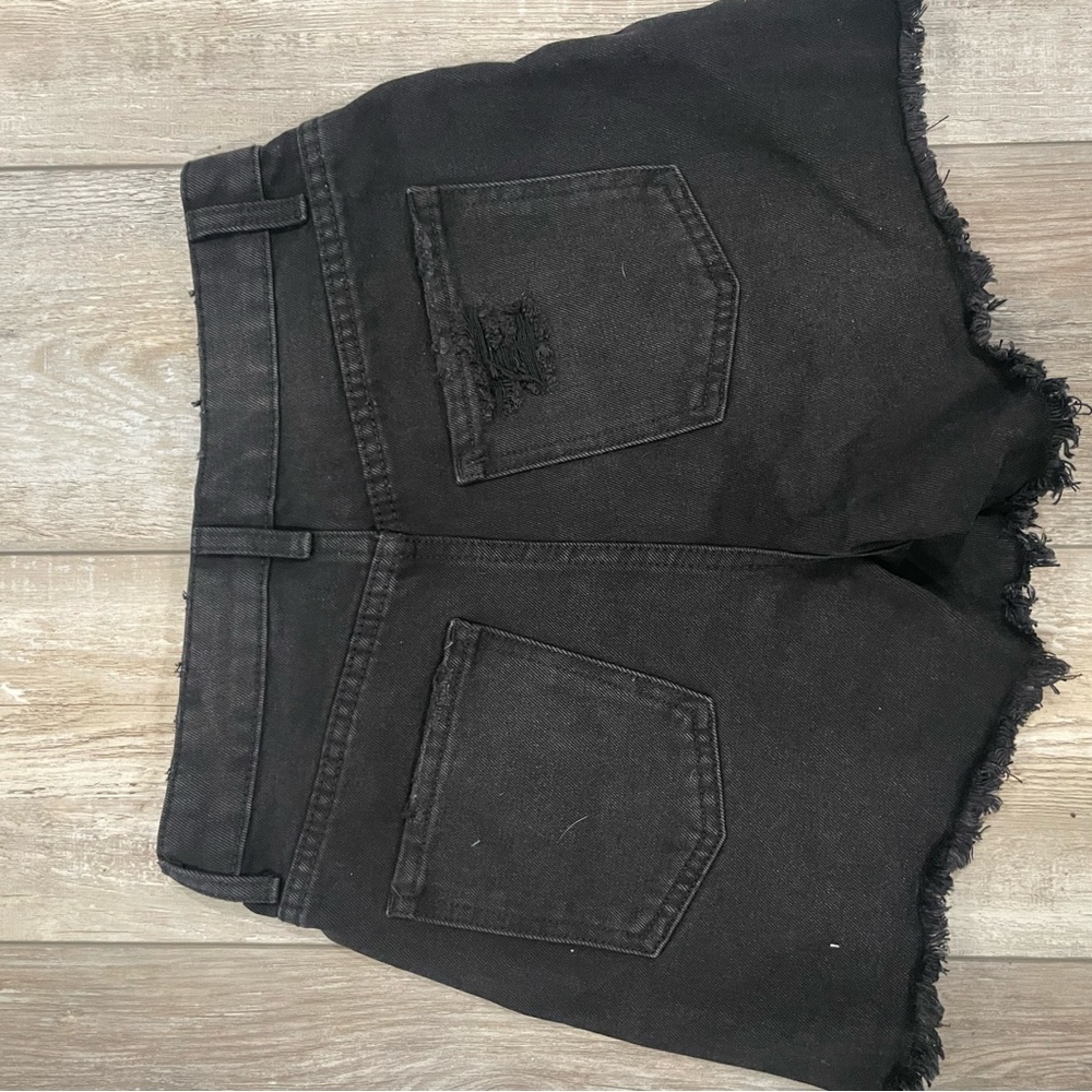 Black denim shorts. Size:3 Tags are still attached. Never worn.